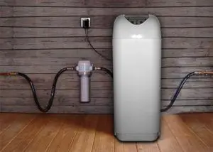 Adoucisseur d’eau domestique installé dans une pièce technique avec raccordements - Installation et entretien par professionnel au Havre