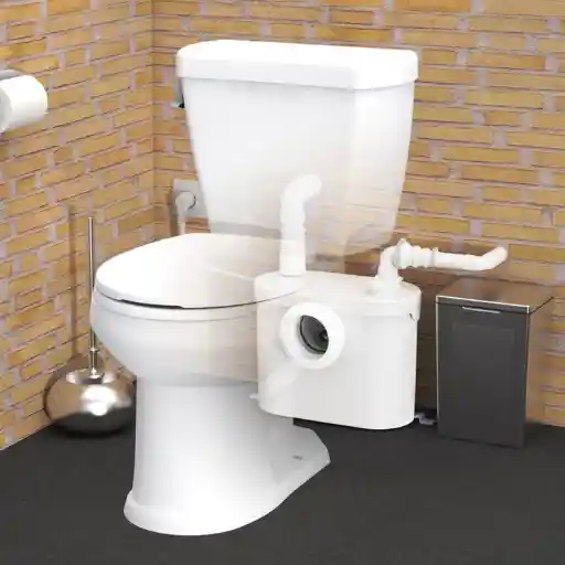 Sanibroyeur installé dans une salle de bain avec évacuation réduite – exemple d’aménagement par Ponos Rénovation au Havre